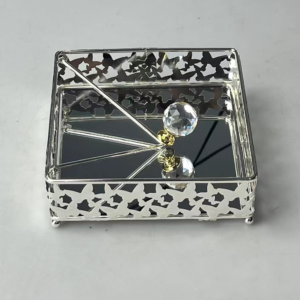 Gold and silver patterned napkin box