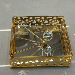 Gold and silver patterned napkin box