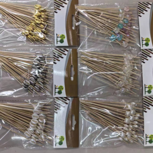 Two pairs of shell bamboo skewers