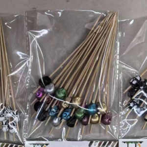Three types of skull-shaped bamboo skewers