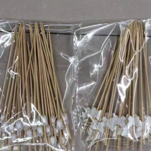 Four white bamboo skewers